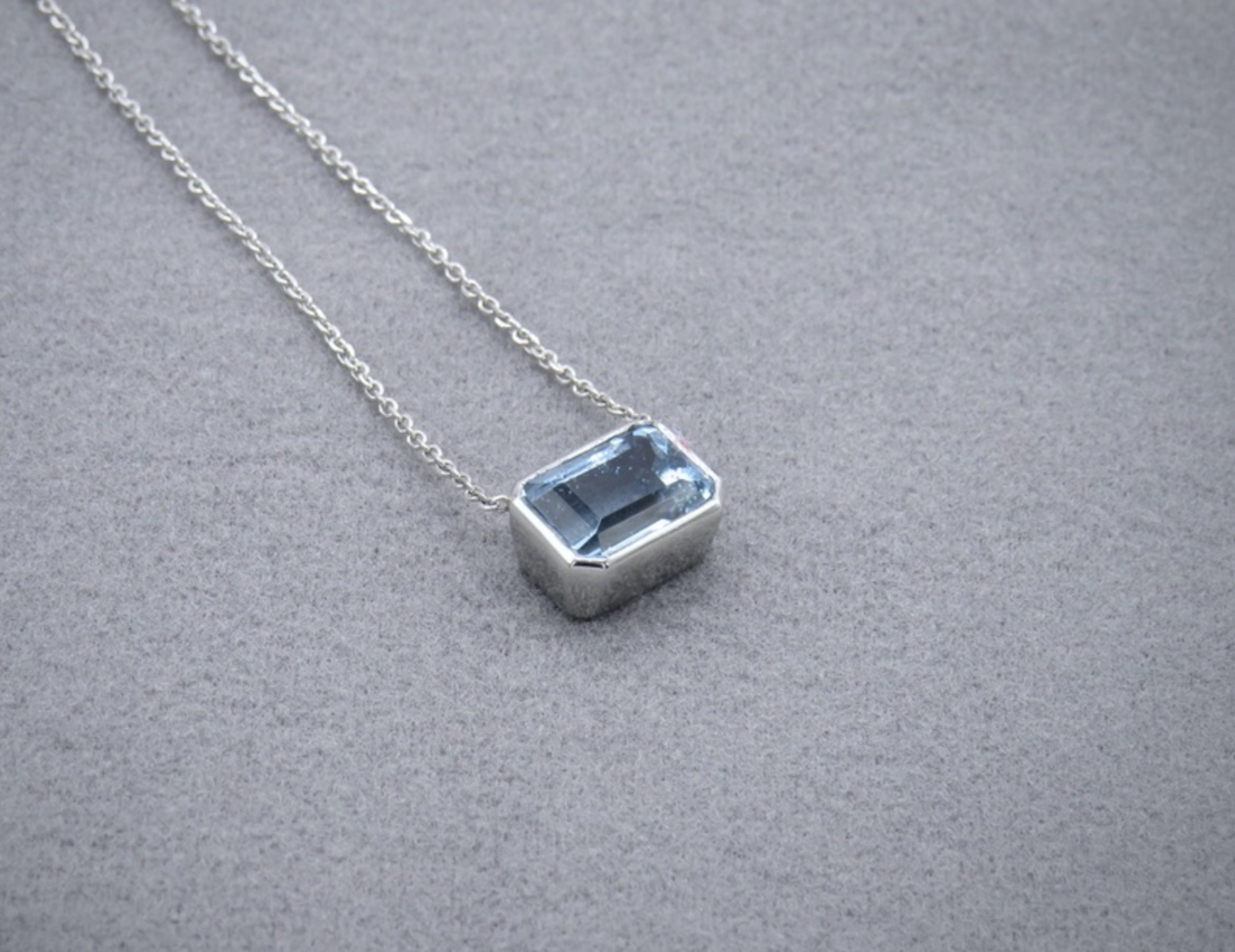 Aquamarine bezel set necklace in platinum
