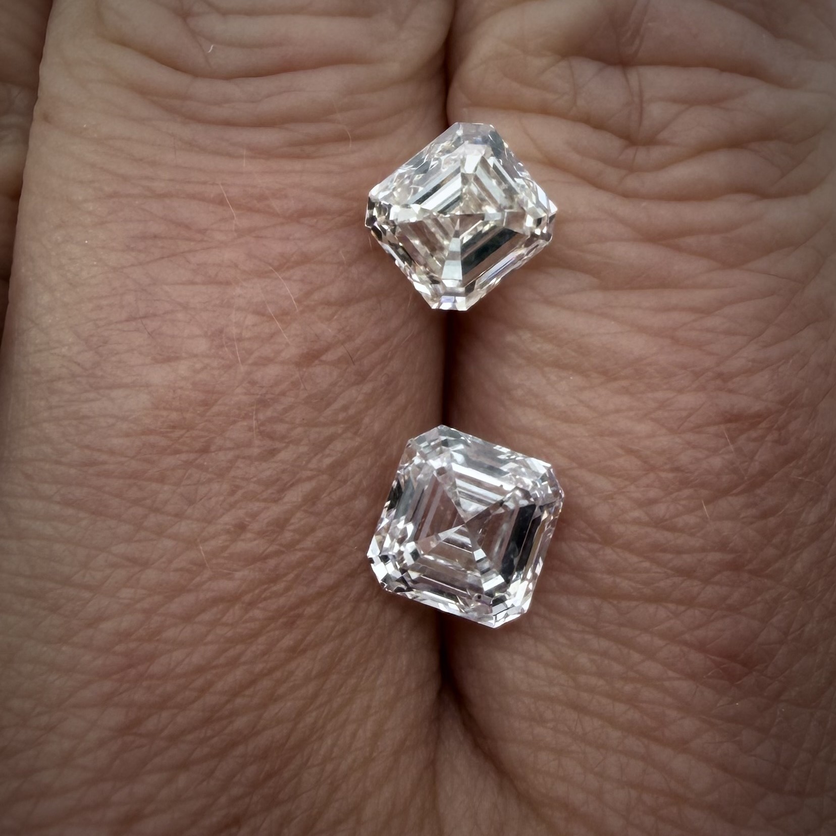 Two asscher cut diamonds